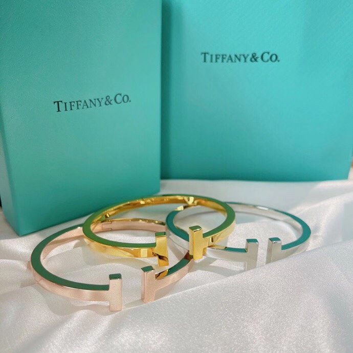 Tiffany Co Tiffany T bracelet 18k yellow gold 18k rose gold sterling silver no gemstones 17cm inner circumference