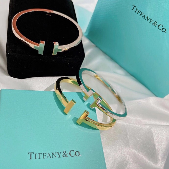 Tiffany Co Tiffany T bracelet 18k yellow gold 18k rose gold sterling silver no gemstones 17cm inner circumference