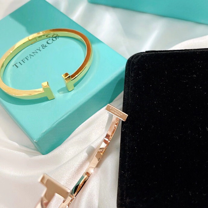 Tiffany Co Tiffany T bracelet 18k yellow gold 18k rose gold sterling silver no gemstones 17cm inner circumference