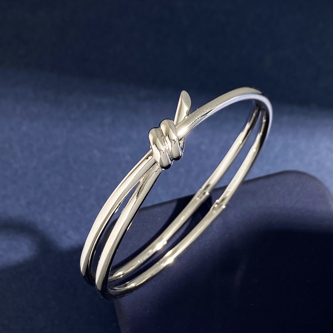 Tiffany Knot bracelet polished yellow gold polished silver-toned metal no gemstones 17cm inner circumference