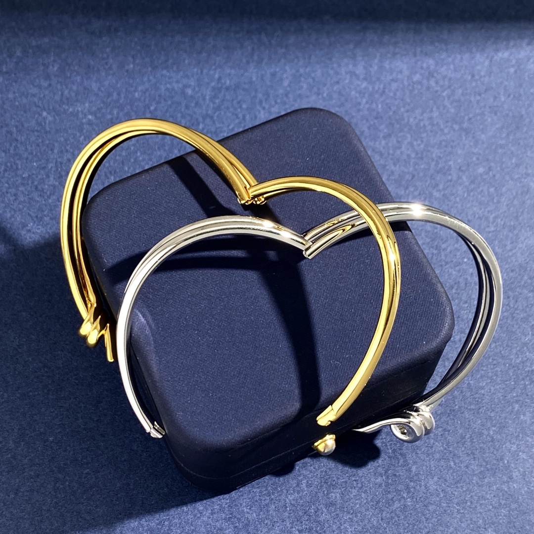 Tiffany Knot bracelet polished yellow gold polished silver-toned metal no gemstones 17cm inner circumference