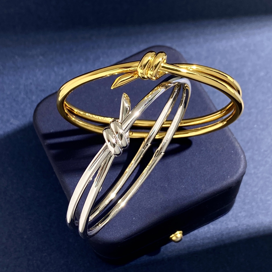 Tiffany Knot bracelet polished yellow gold polished silver-toned metal no gemstones 17cm inner circumference