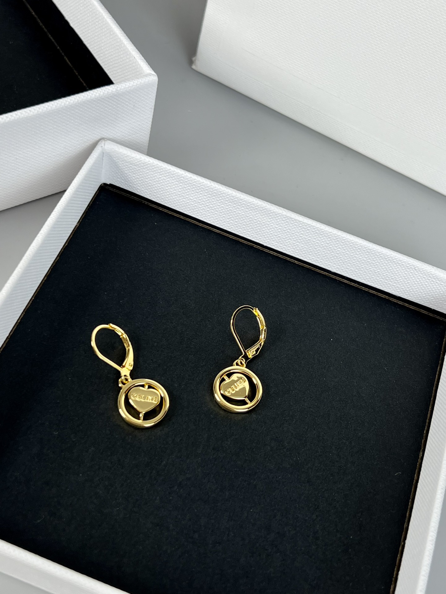 Celine Rotating Heart in Circle Drop Earrings earrings Gold-tone metal One Size