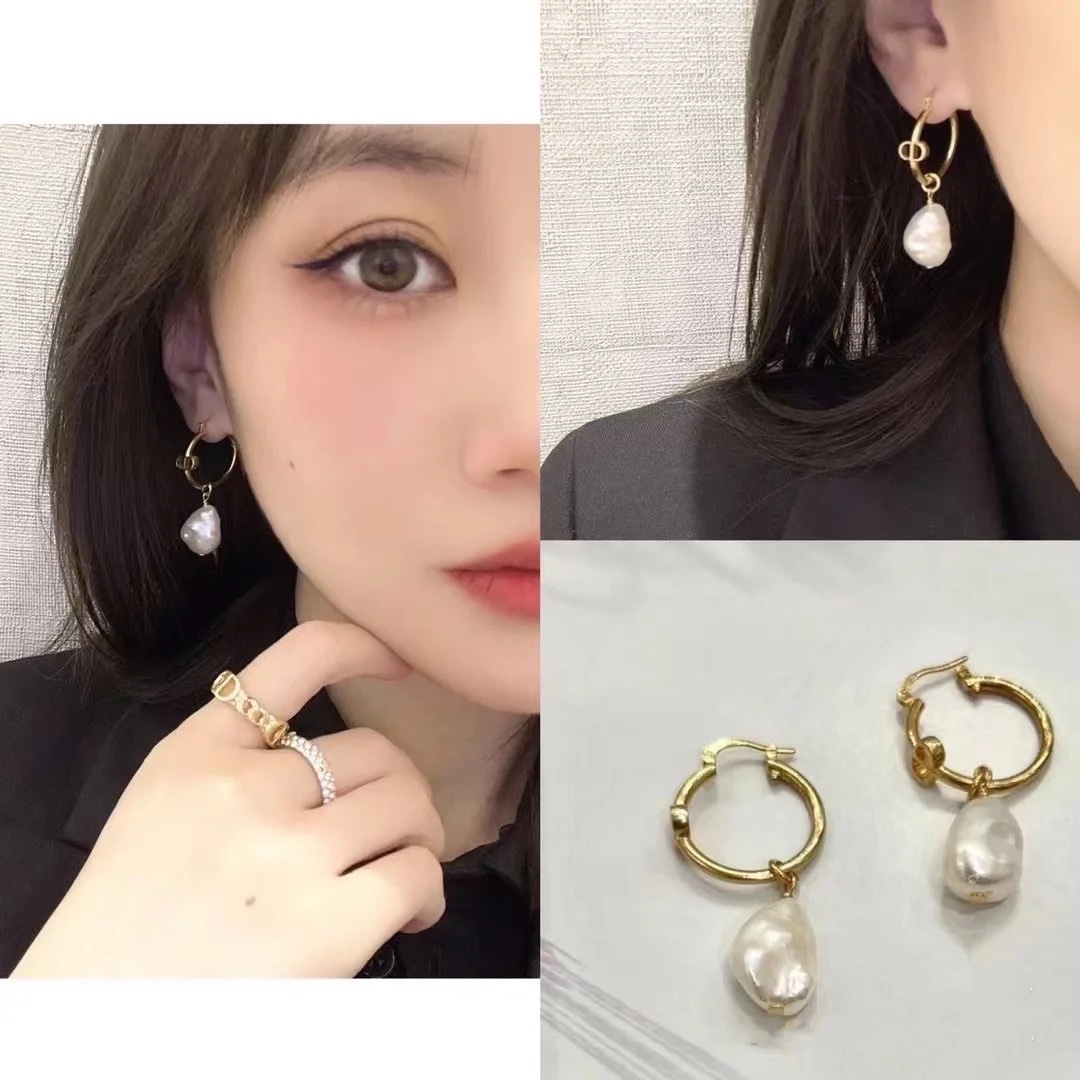 Dior CD Logo Baroque Pearl Drop Hoop Earrings earrings gold-tone metal with white iridescent baroque pearl drops 2cm hoop diameter 3 5cm total drop length