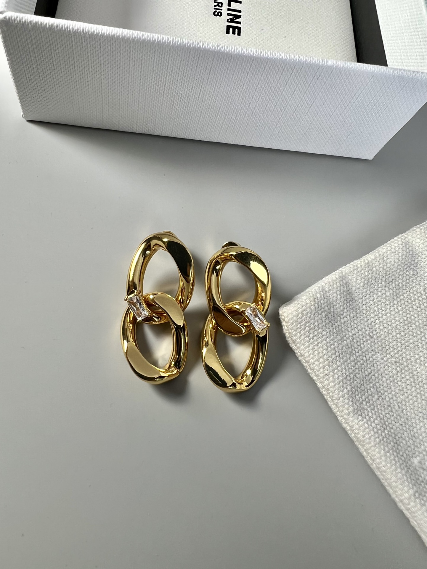 Celine Interlocking Chain Crystal Drop Earrings earrings Gold-tone metal with clear baguette-cut crystals 3cm drop length