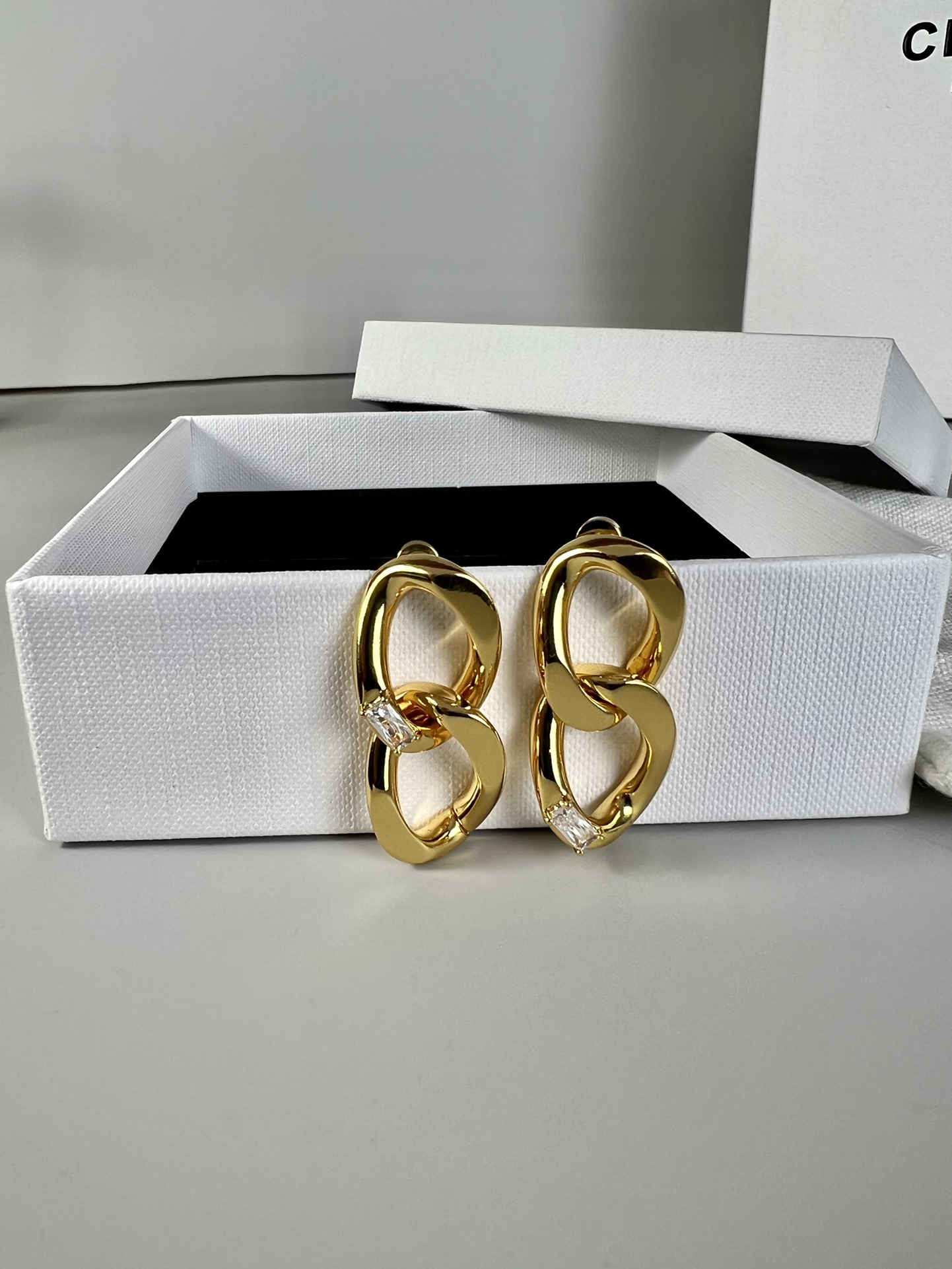 Celine Interlocking Chain Crystal Drop Earrings earrings Gold-tone metal with clear baguette-cut crystals 3cm drop length