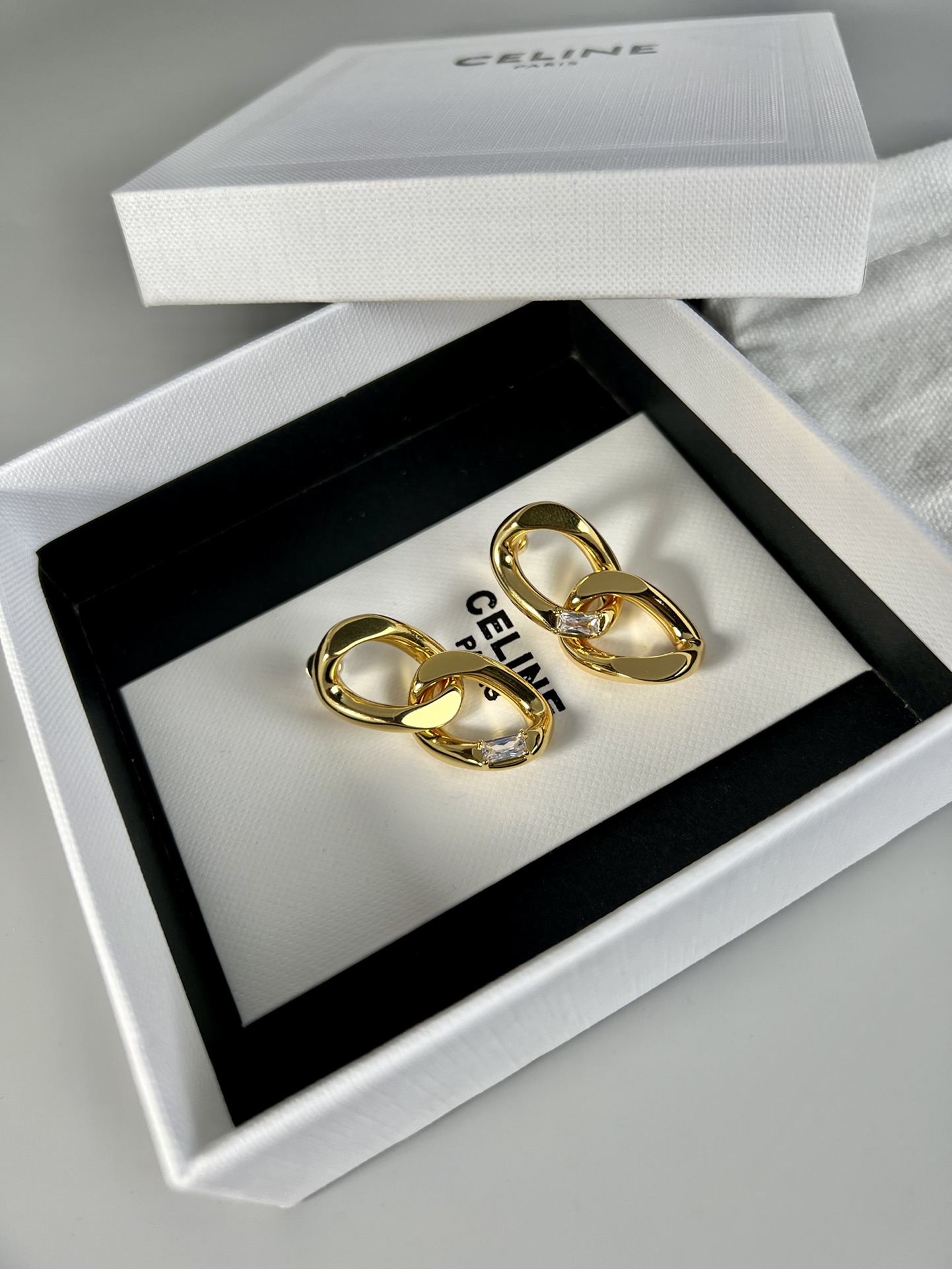 Celine Interlocking Chain Crystal Drop Earrings earrings Gold-tone metal with clear baguette-cut crystals 3cm drop length