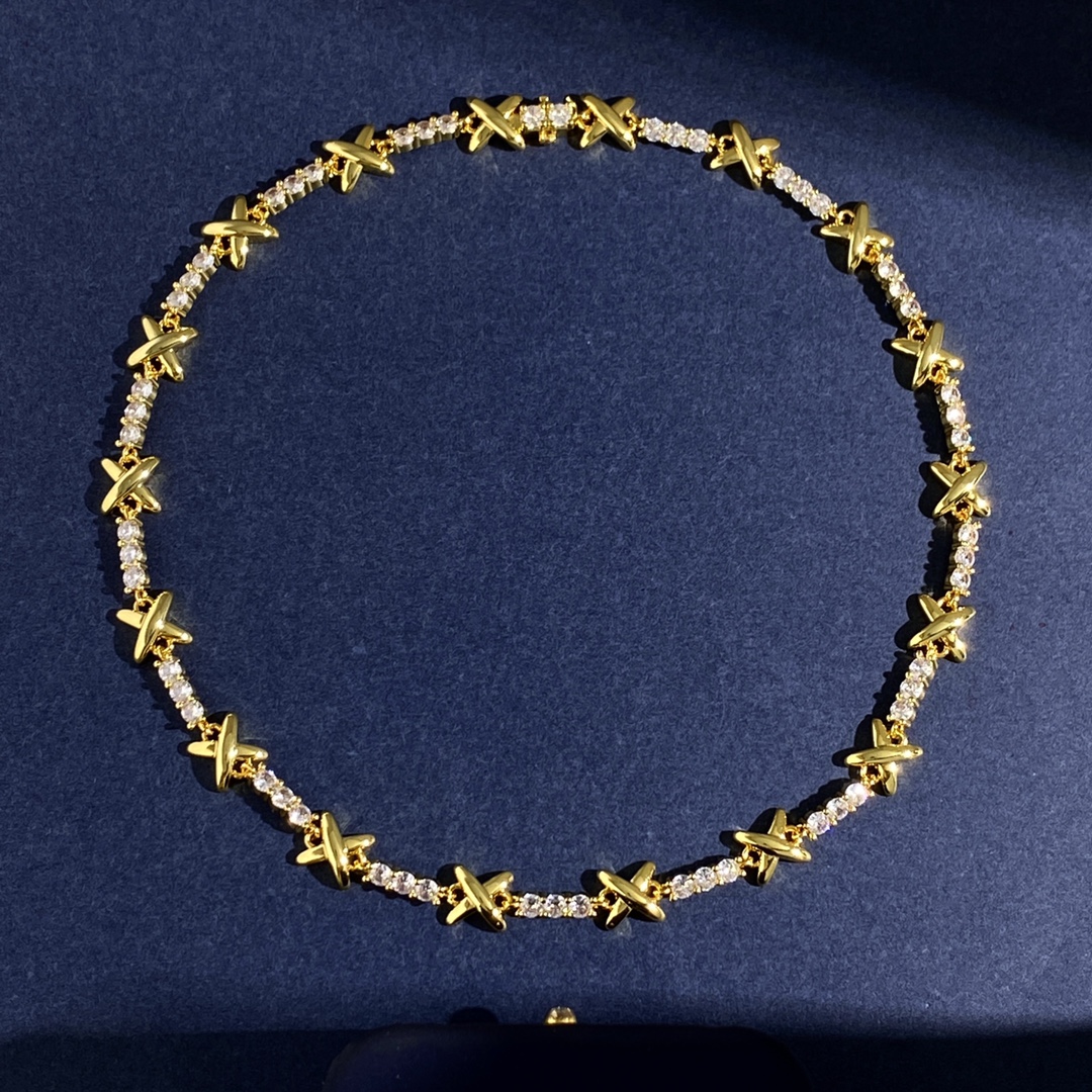 Tiffany X Signature Tennis Bracelet bracelet Gold-toned metal with clear round-cut gemstones Silver-toned metal with clear round-cut gemstones 7 inches
