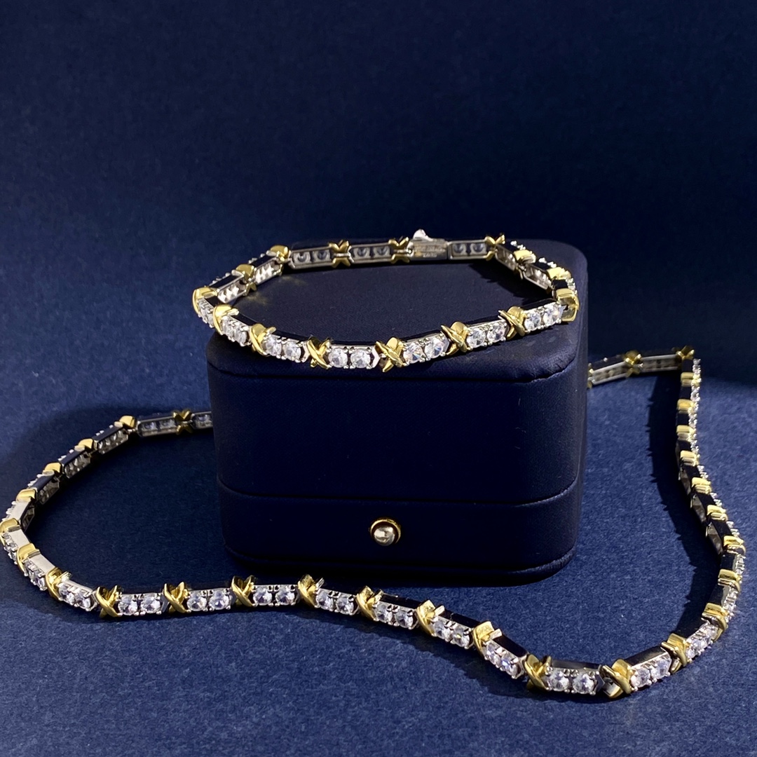 Tiffany X Link necklace Two-tone sterling silver and gold-plated metal with clear round-cut cubic zirconia stones 18 inches
