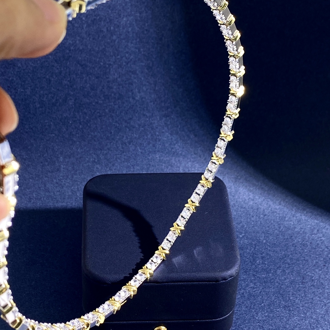Tiffany X Link necklace Two-tone sterling silver and gold-plated metal with clear round-cut cubic zirconia stones 18 inches