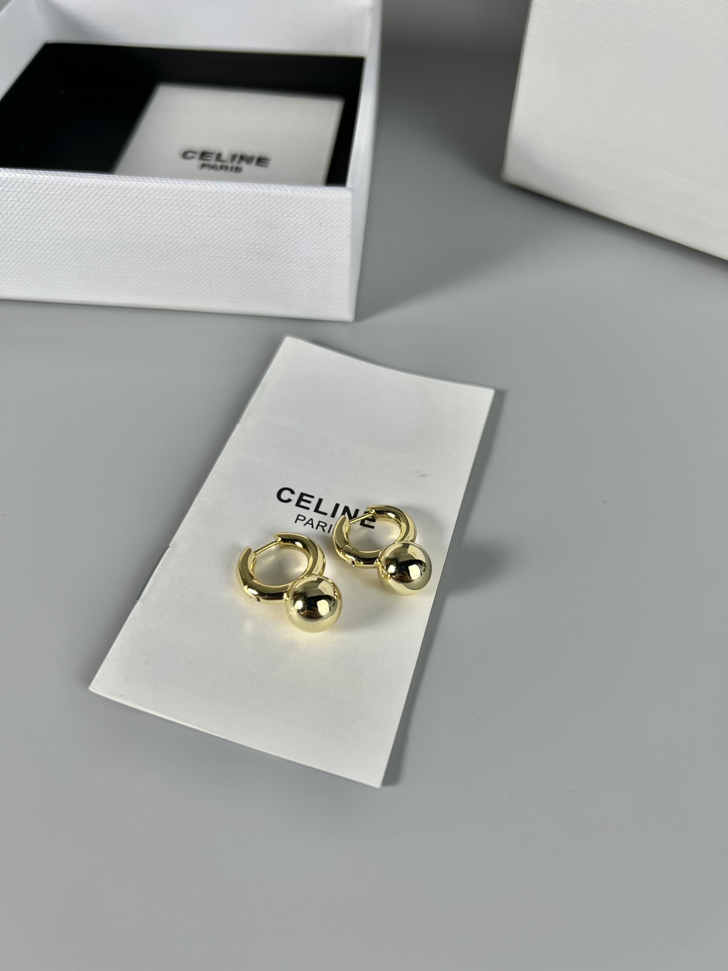 Celine Sphere Detail Small Hoop Earrings earrings gold-tone metal no accent stones 1 2cm hoop diameter
