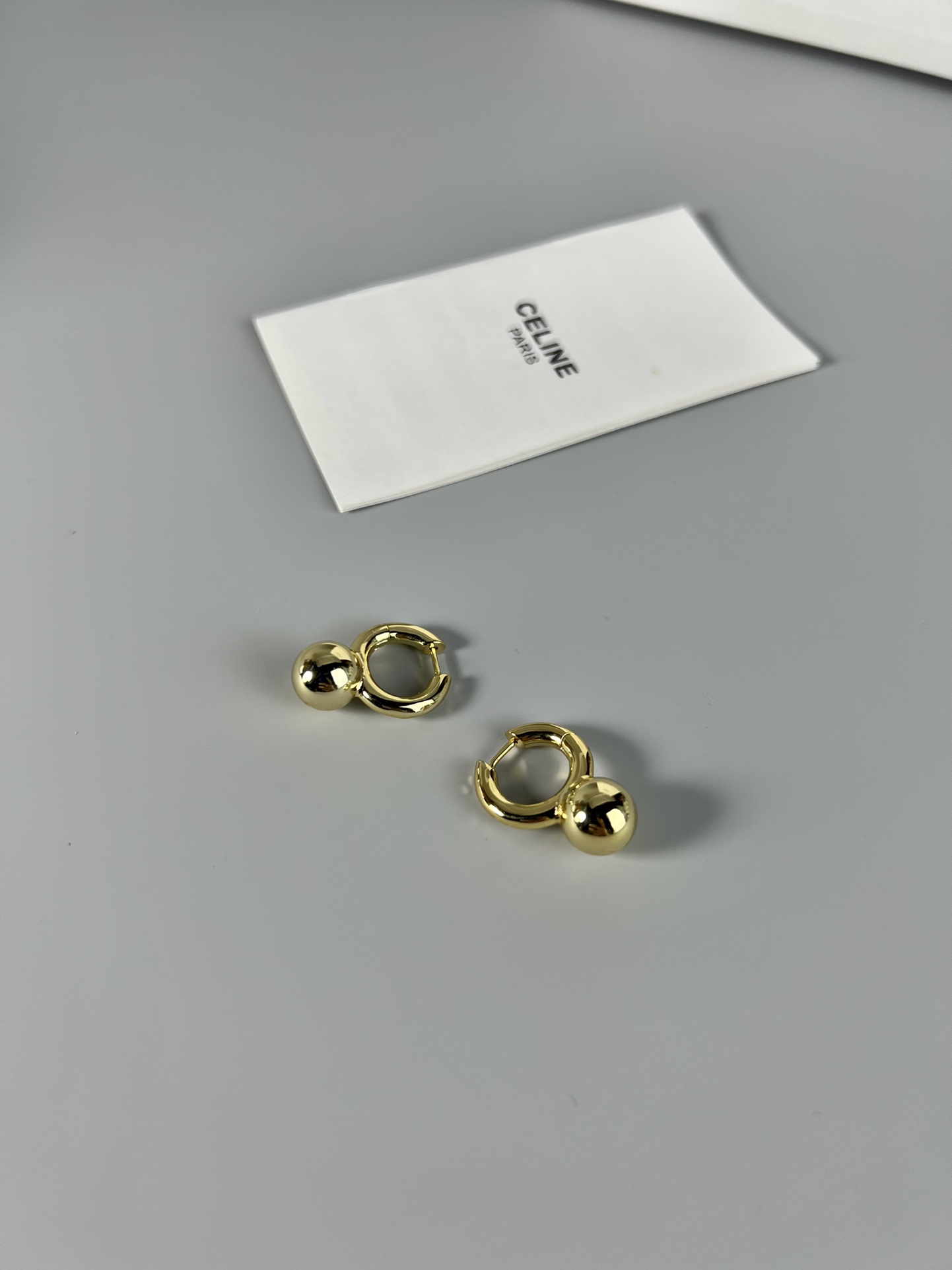 Celine Sphere Detail Small Hoop Earrings earrings gold-tone metal no accent stones 1 2cm hoop diameter