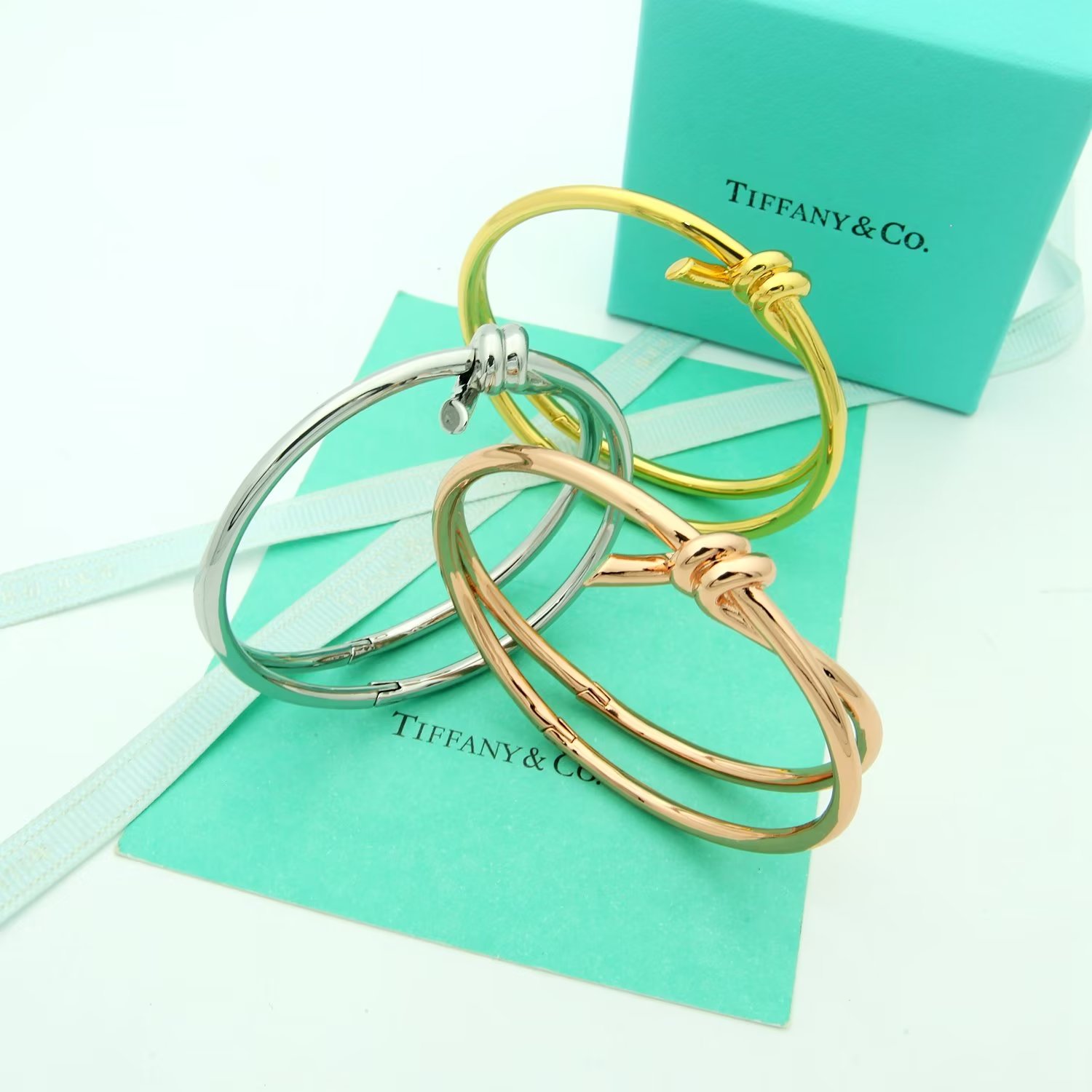 Tiffany Co Tiffany Knot bracelet Available in 18k yellow gold 18k rose gold and sterling silver no gemstones 17cm inner circumference