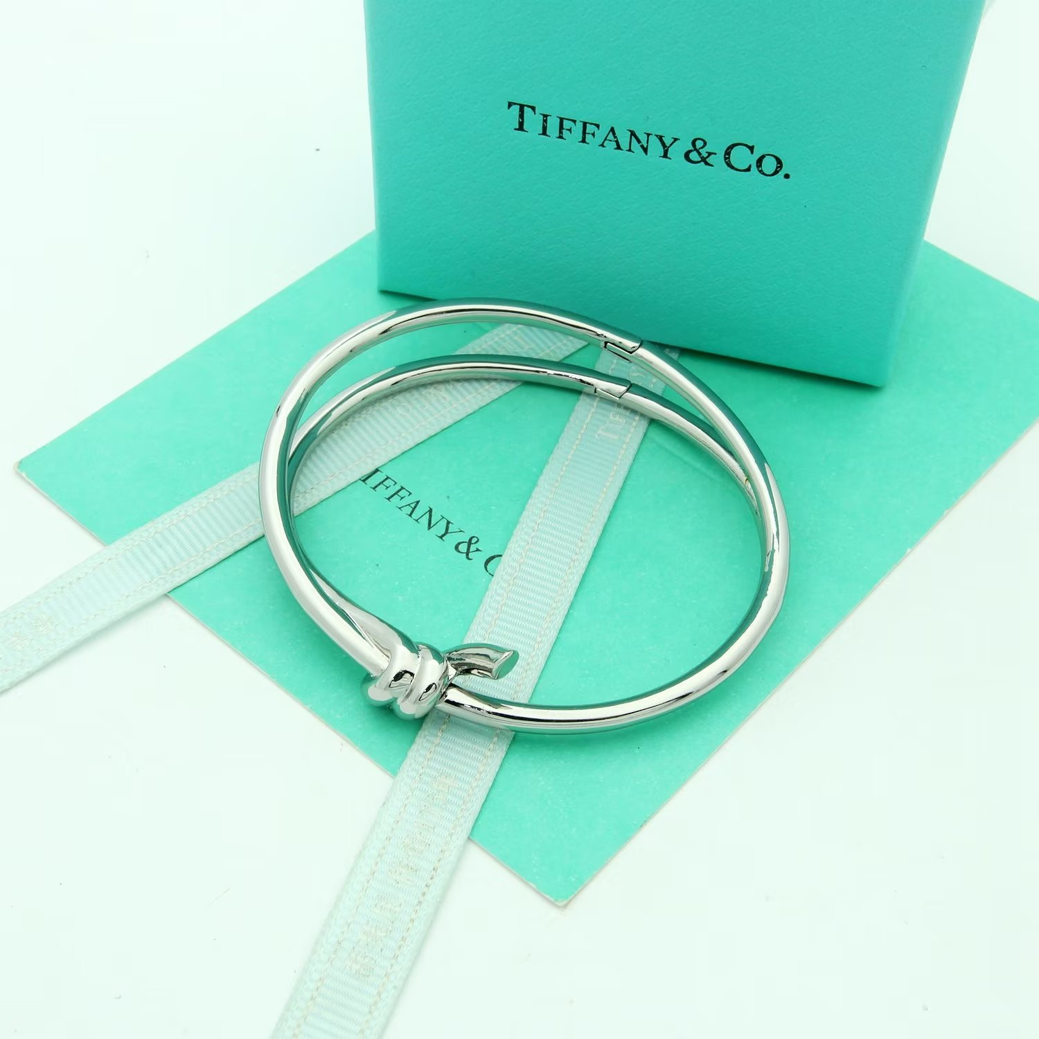 Tiffany Co Tiffany Knot bracelet Available in 18k yellow gold 18k rose gold and sterling silver no gemstones 17cm inner circumference