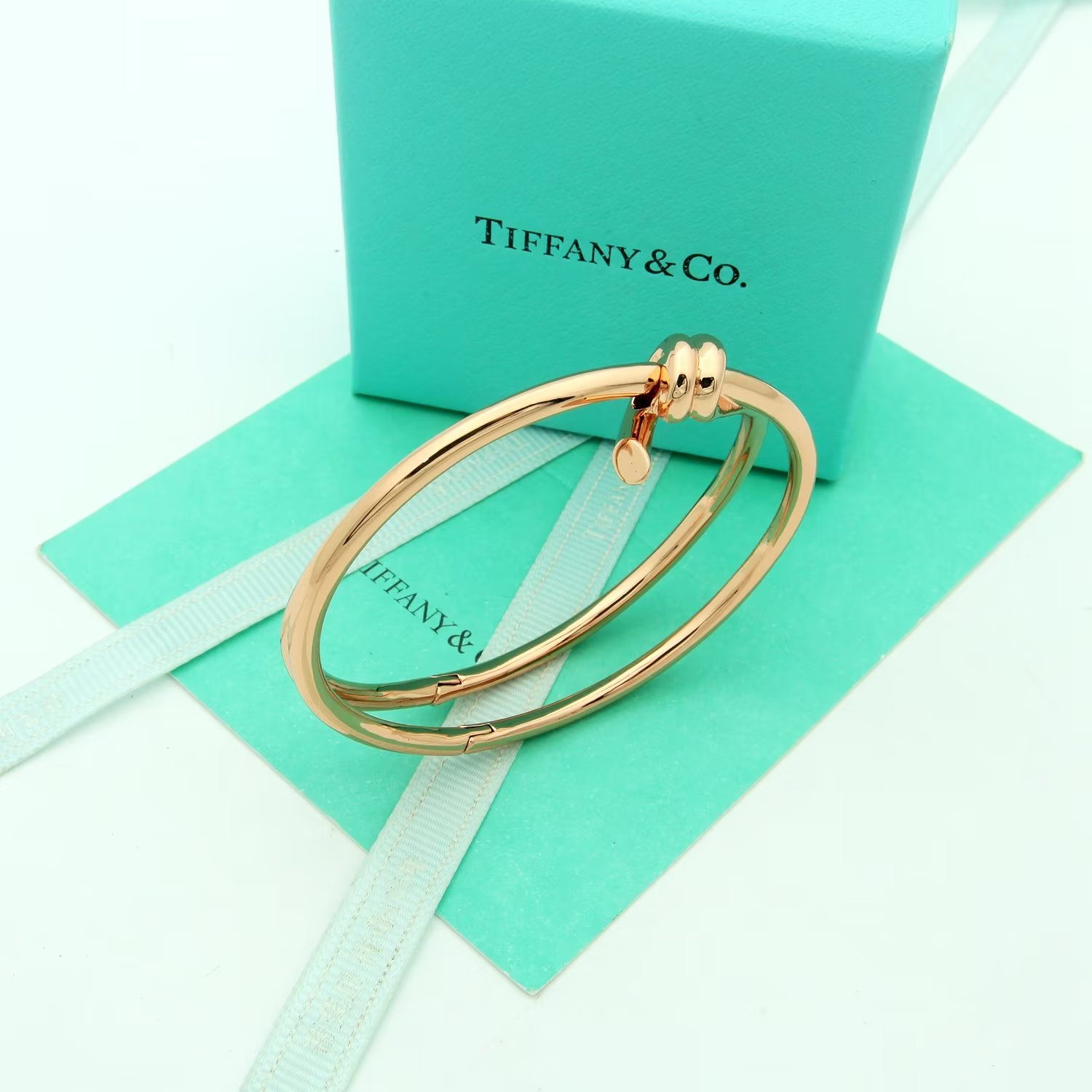 Tiffany Co Tiffany Knot bracelet Available in 18k yellow gold 18k rose gold and sterling silver no gemstones 17cm inner circumference