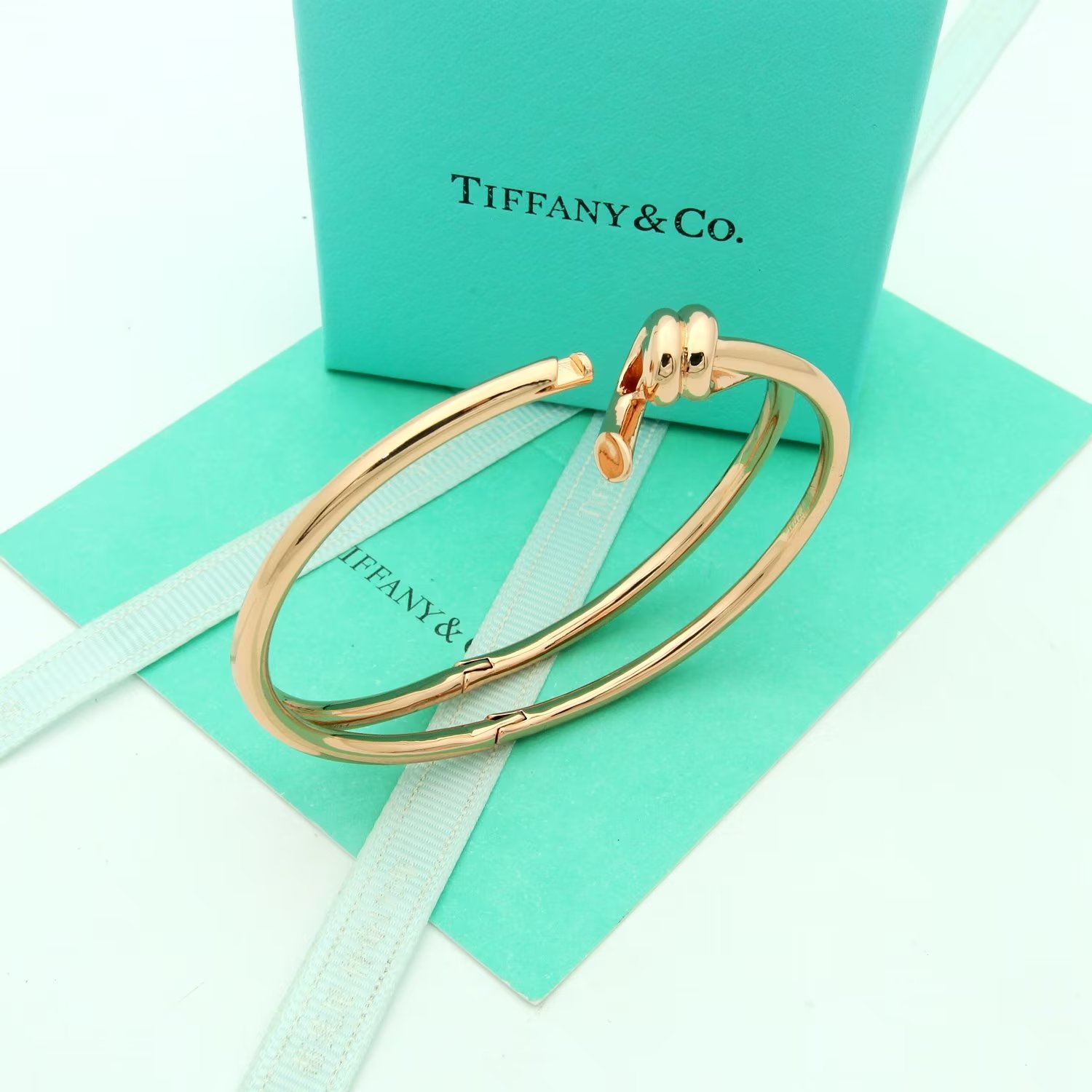 Tiffany Co Tiffany Knot bracelet Available in 18k yellow gold 18k rose gold and sterling silver no gemstones 17cm inner circumference