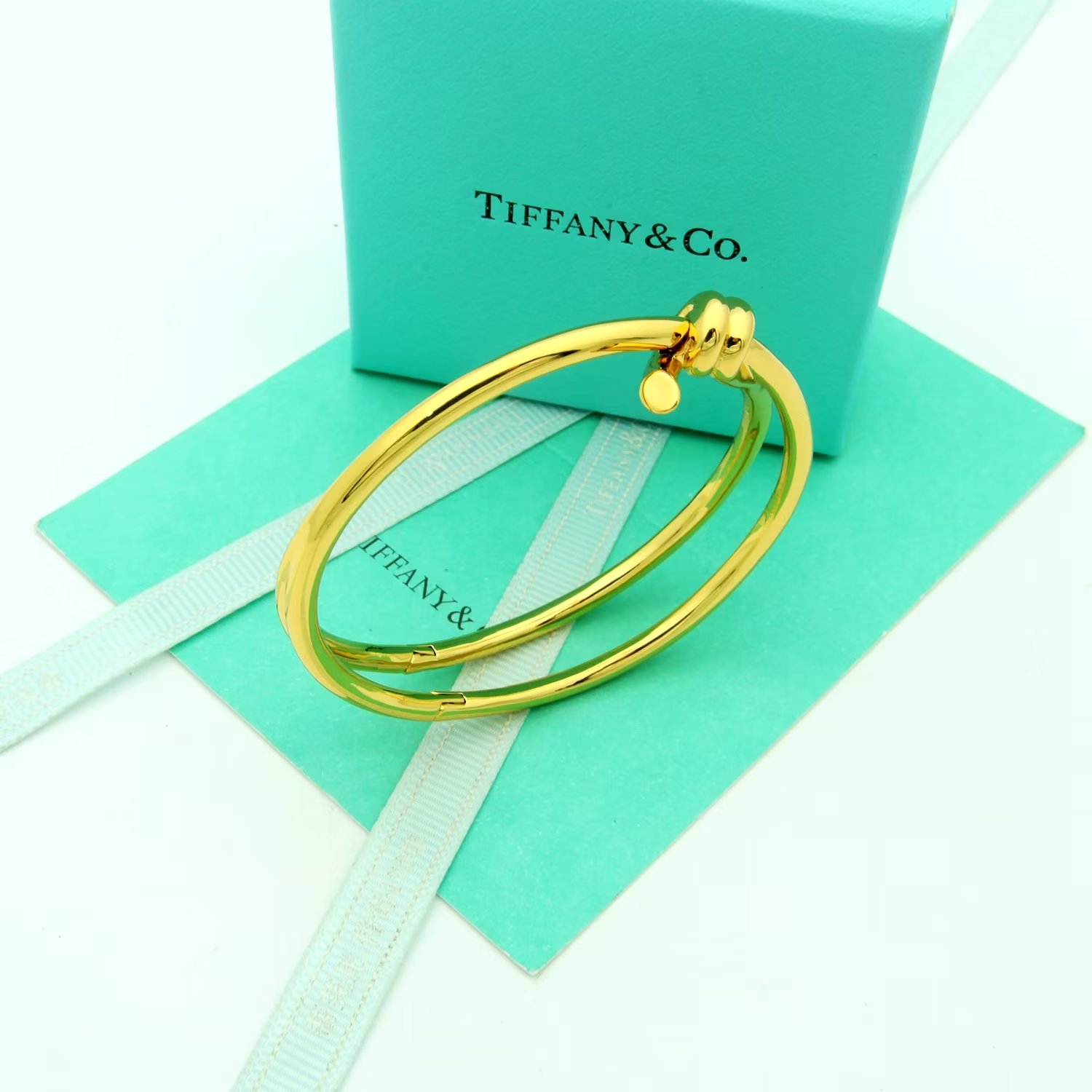 Tiffany Co Tiffany Knot bracelet Available in 18k yellow gold 18k rose gold and sterling silver no gemstones 17cm inner circumference