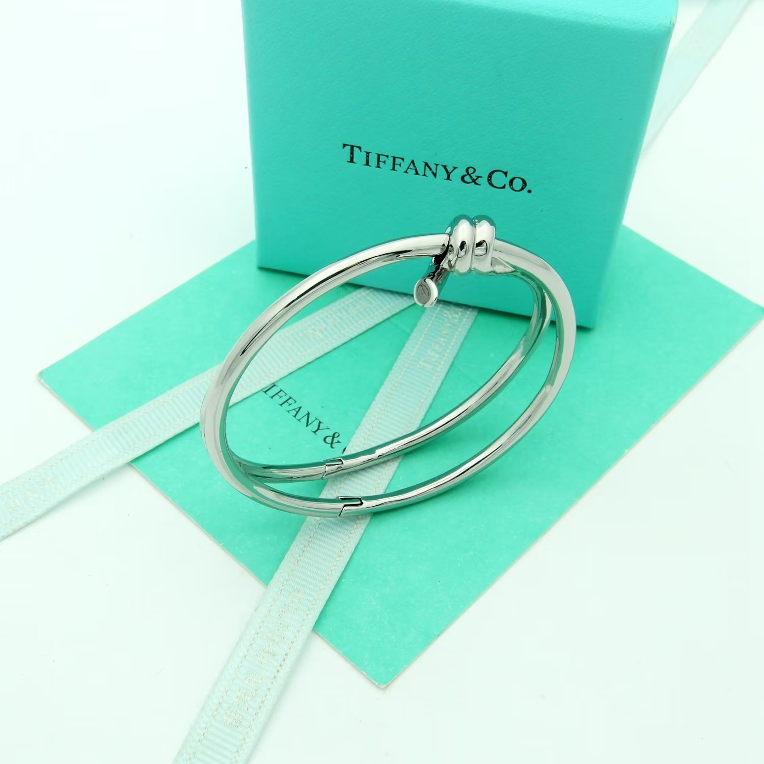Tiffany Co Tiffany Knot bracelet Available in 18k yellow gold 18k rose gold and sterling silver no gemstones 17cm inner circumference