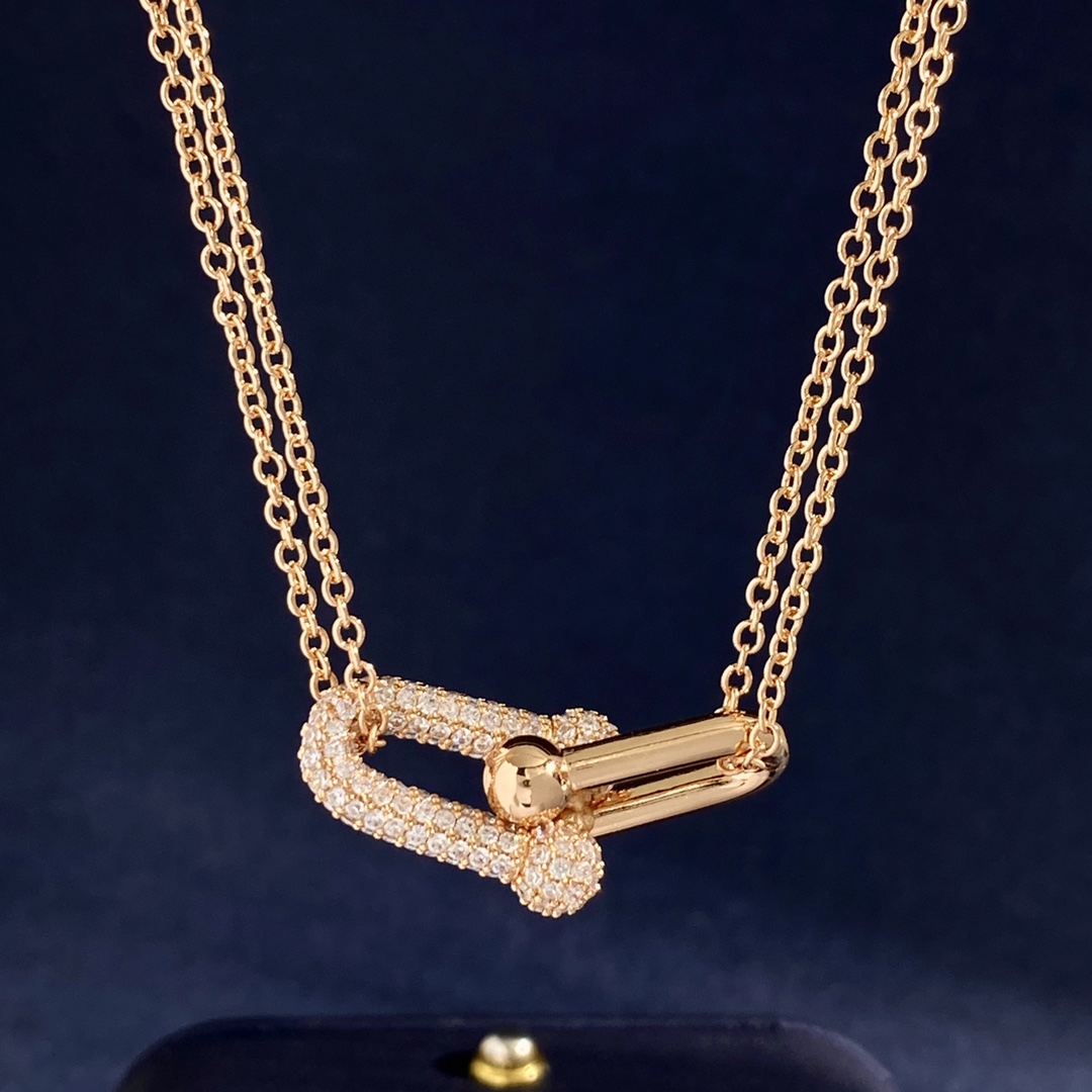 Tiffany HardWear Double Link Pave Pendant necklace Available in 18k yellow gold with clear pave diamonds 18k rose gold with clear pave diamonds and sterling silver with clear pave diamonds 18 inches