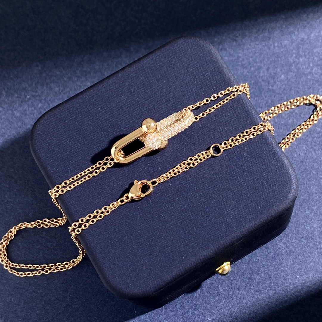 Tiffany HardWear Double Link Pave Pendant necklace Available in 18k yellow gold with clear pave diamonds 18k rose gold with clear pave diamonds and sterling silver with clear pave diamonds 18 inches