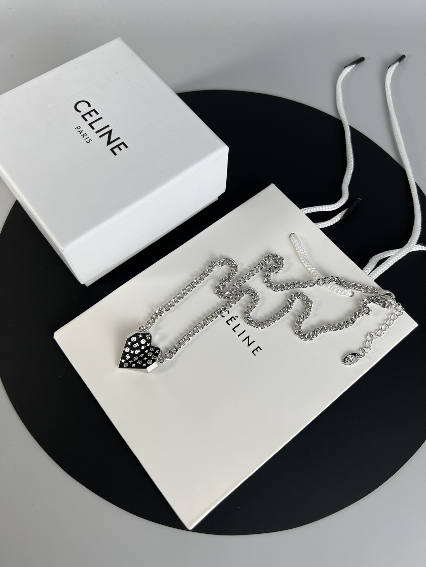 Celine Monogram Studded Split Heart Pendant necklace Silver-toned metal with black enamel and clear crystal accents 60cm