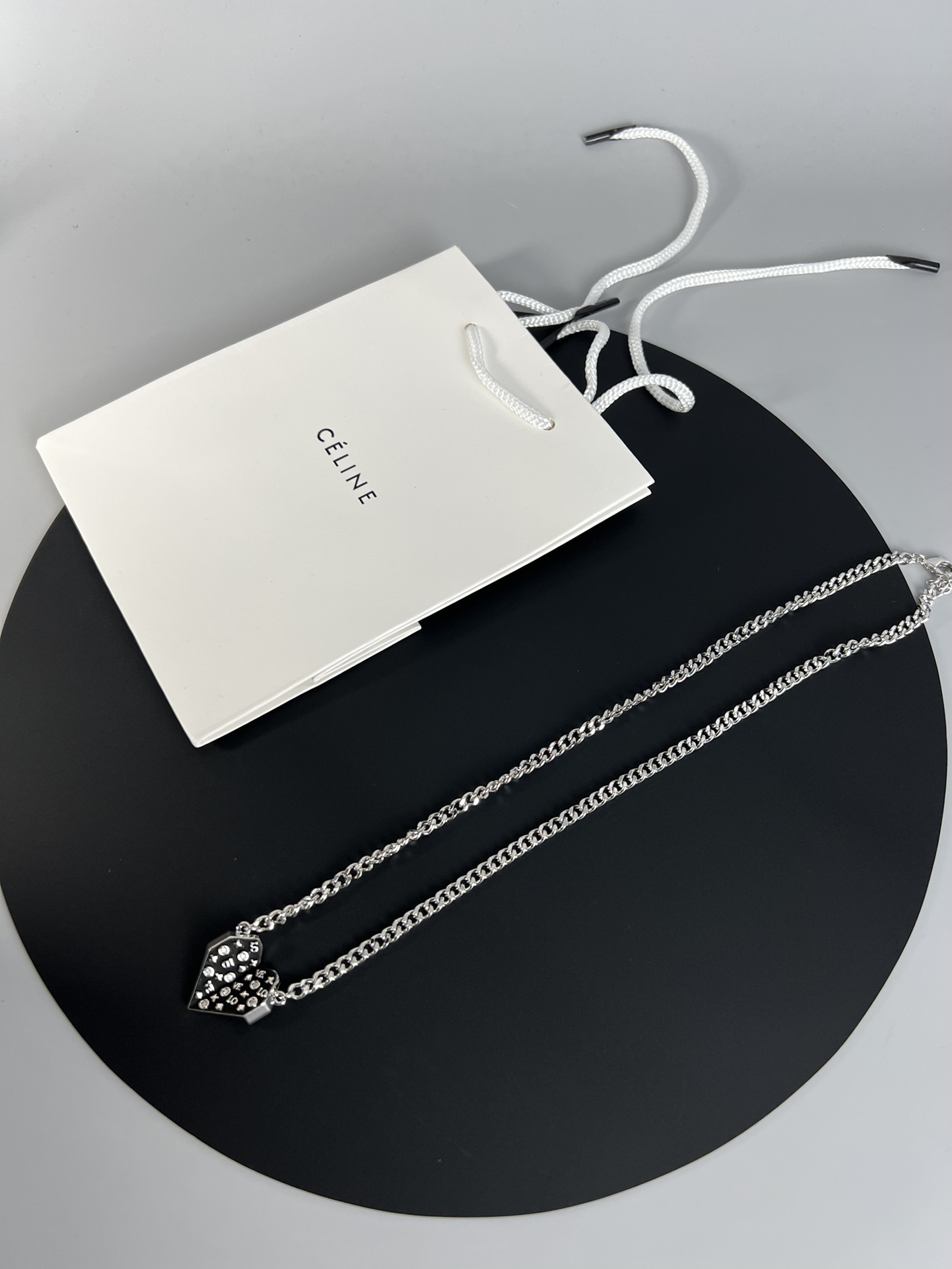 Celine Monogram Studded Split Heart Pendant necklace Silver-toned metal with black enamel and clear crystal accents 60cm