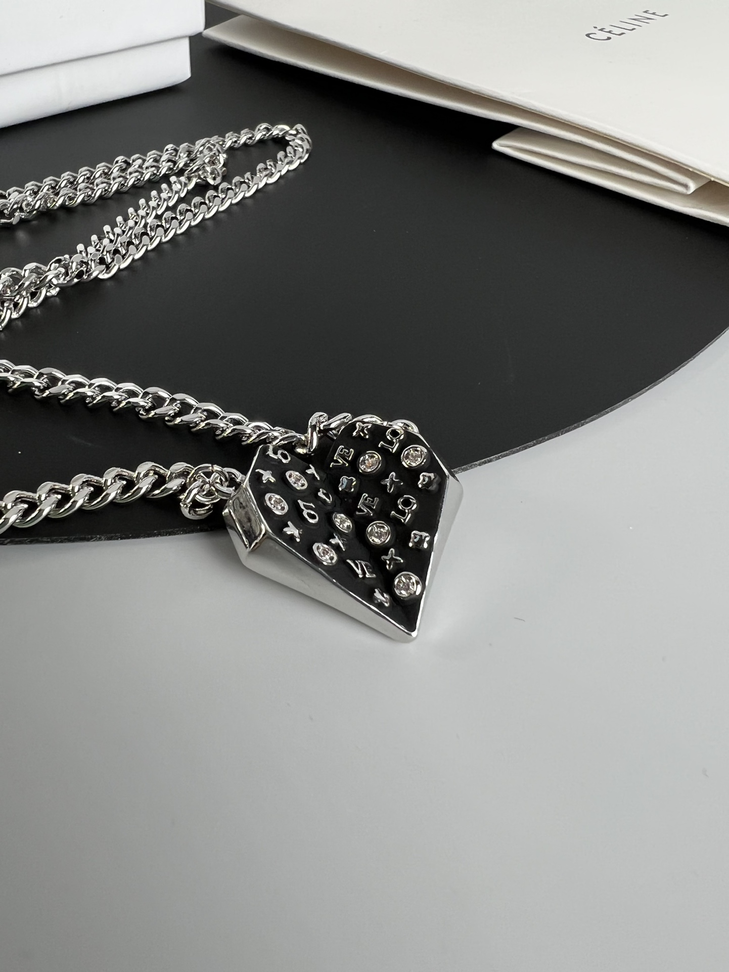Celine Monogram Studded Split Heart Pendant necklace Silver-toned metal with black enamel and clear crystal accents 60cm