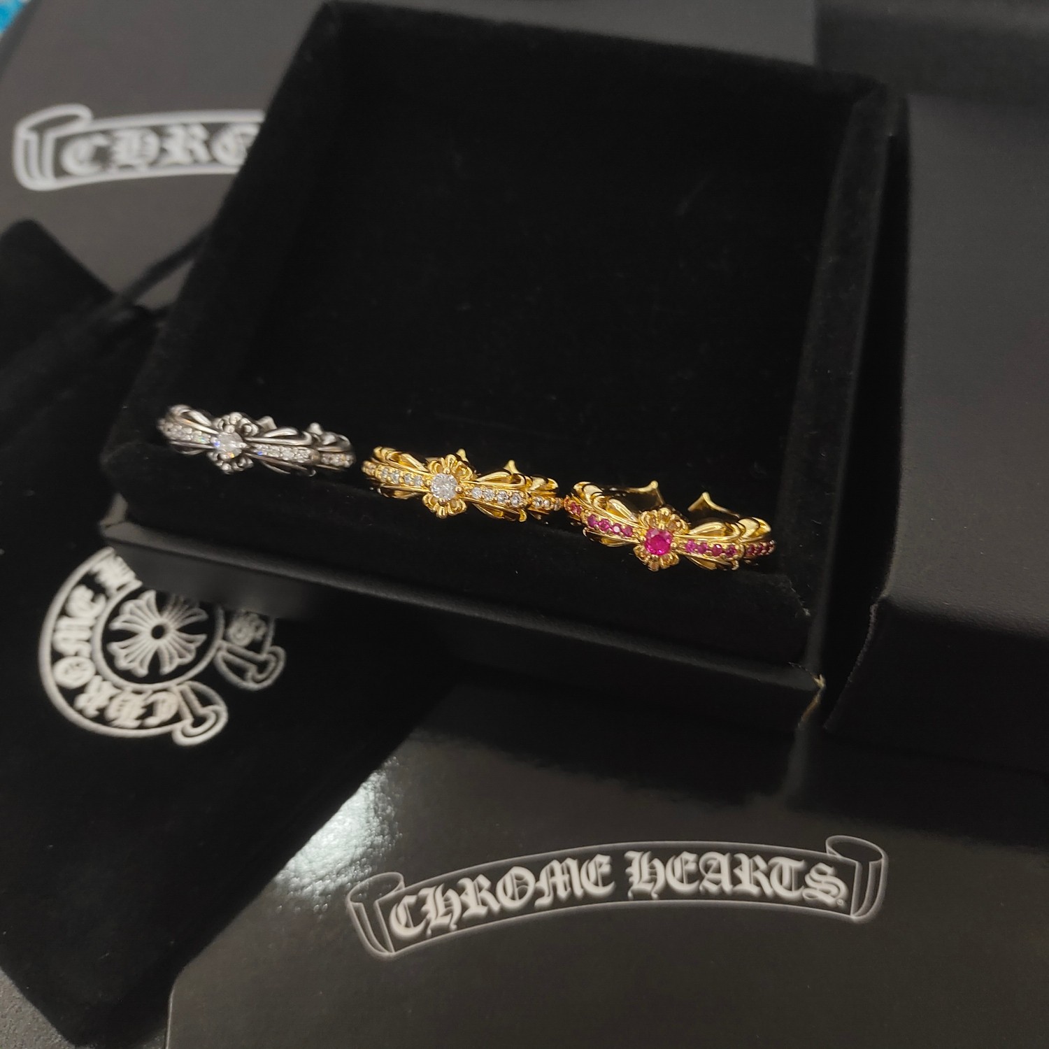 Chrome Hearts Baby Classic Floral Cross Ring ring Oxidized sterling silver with clear cubic zirconia 22k gold plating with clear cubic zirconia 22k gold plating with pink ruby cubic zirconia US 7
