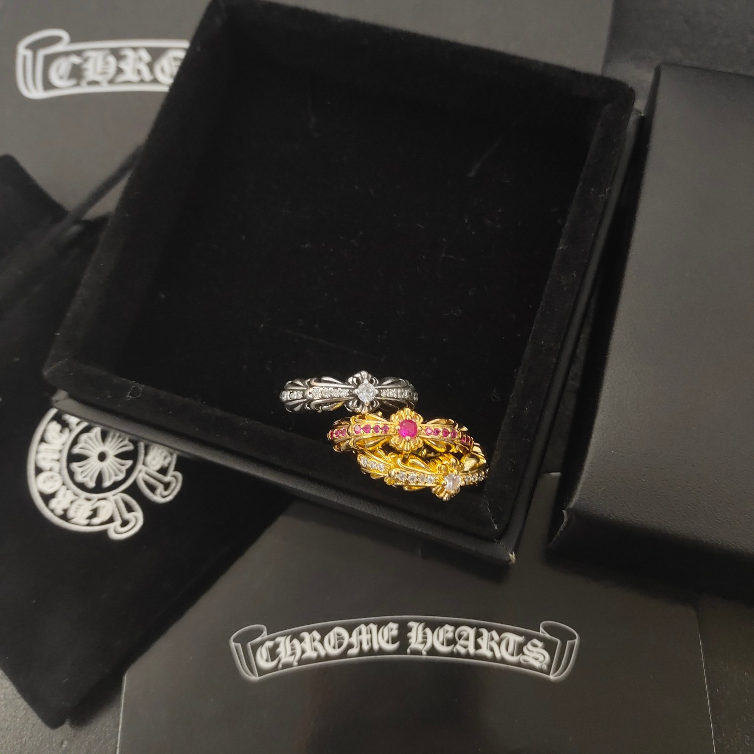 Chrome Hearts Baby Classic Floral Cross Ring ring Oxidized sterling silver with clear cubic zirconia 22k gold plating with clear cubic zirconia 22k gold plating with pink ruby cubic zirconia US 7