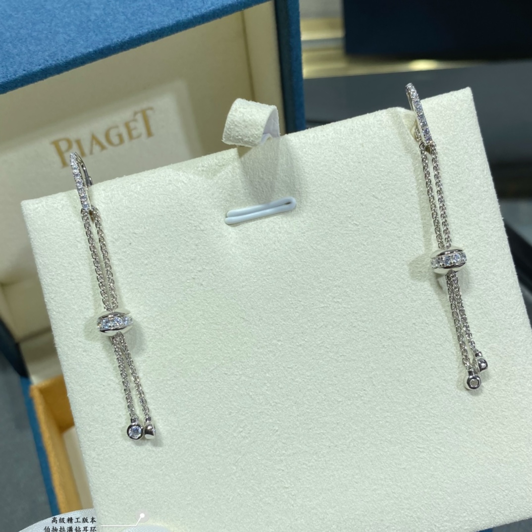 Piaget Possession earrings 18k white gold with clear round diamonds 18k yellow gold with clear round diamonds 4 5cm drop length