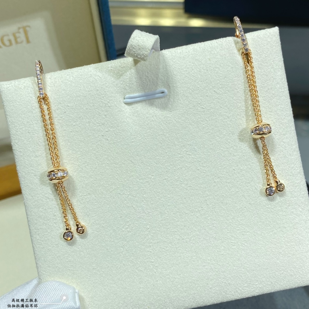Piaget Possession earrings 18k white gold with clear round diamonds 18k yellow gold with clear round diamonds 4 5cm drop length