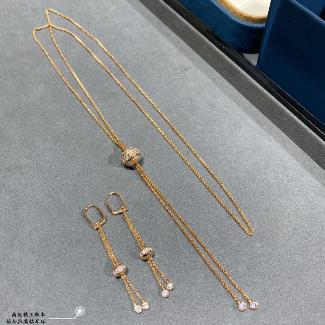 Piaget Possession earrings 18k white gold with clear round diamonds 18k yellow gold with clear round diamonds 4 5cm drop length