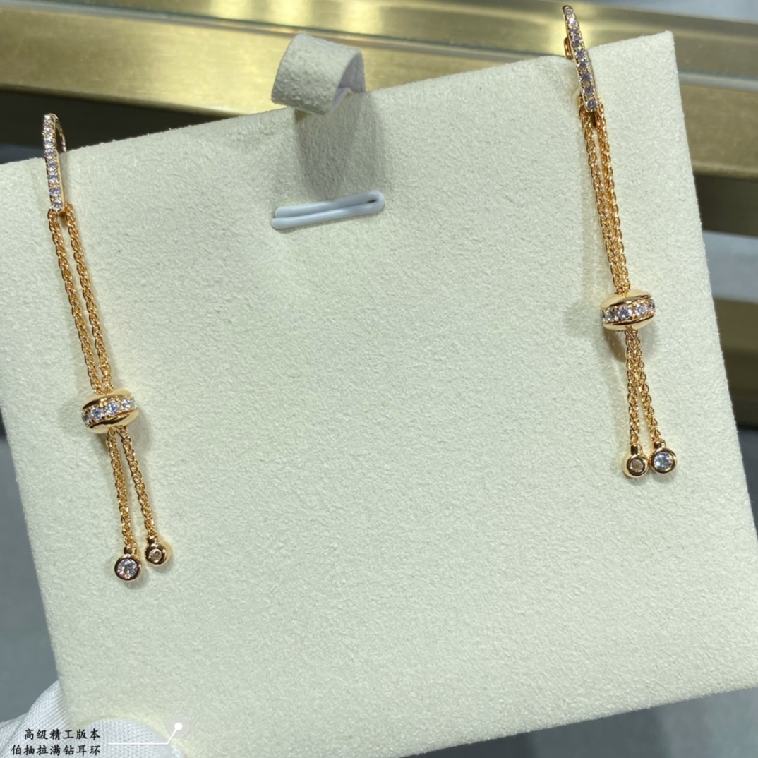 Piaget Possession earrings 18k white gold with clear round diamonds 18k yellow gold with clear round diamonds 4 5cm drop length