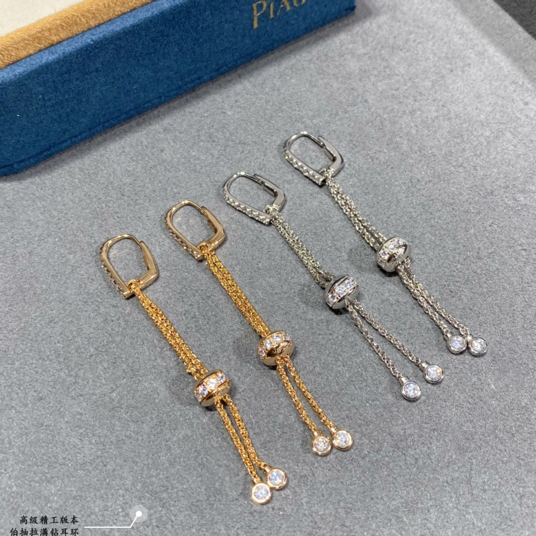 Piaget Possession earrings 18k white gold with clear round diamonds 18k yellow gold with clear round diamonds 4 5cm drop length