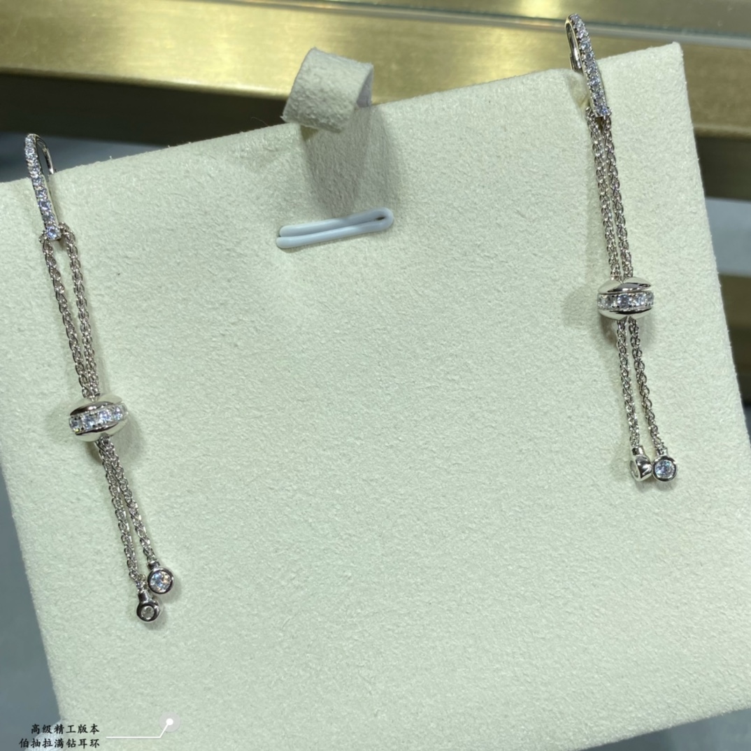 Piaget Possession earrings 18k white gold with clear round diamonds 18k yellow gold with clear round diamonds 4 5cm drop length