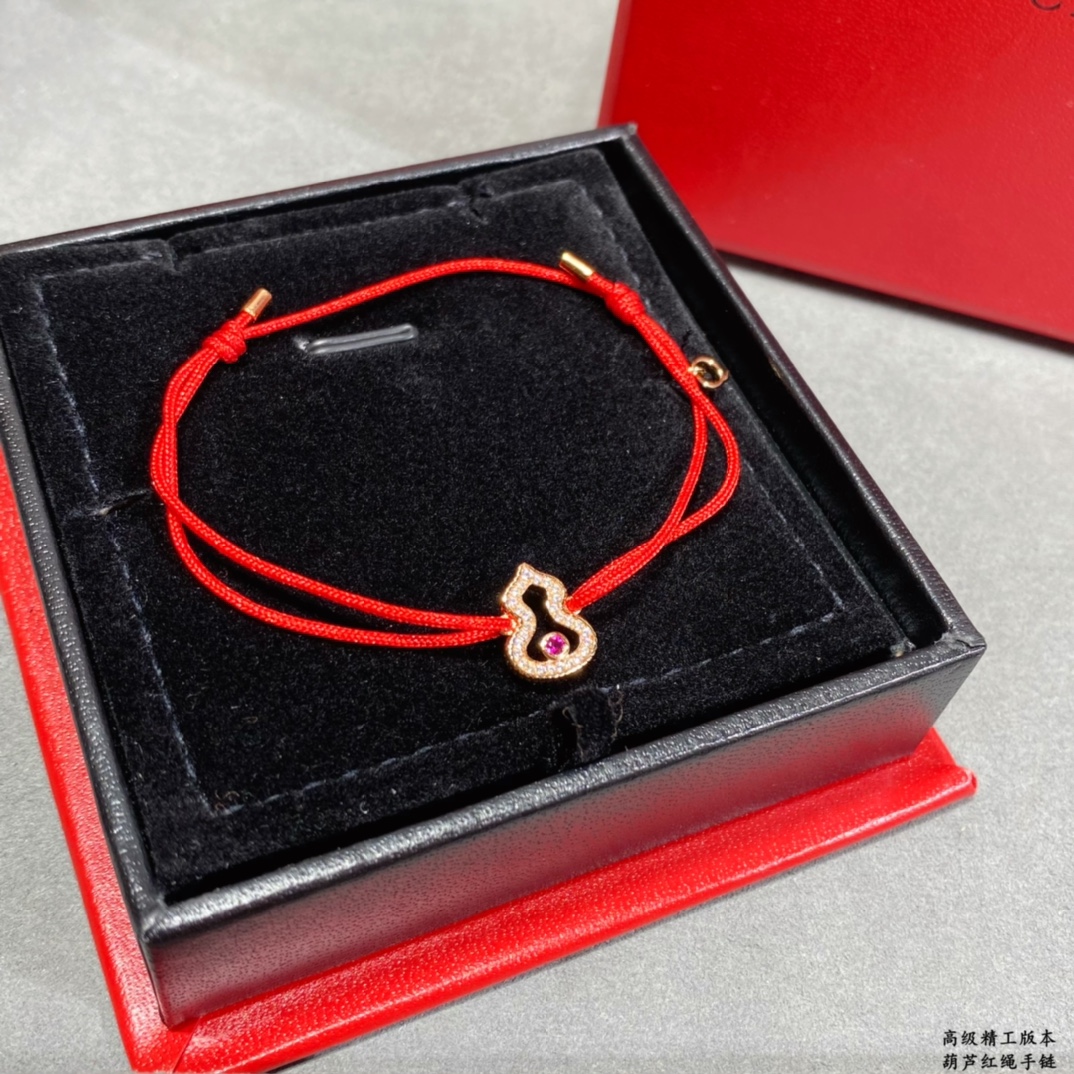 Qeelin Wulu bracelet 18k rose gold red cord clear diamond pave ruby red center stone adjustable sliding knot fits 15-19cm wrist