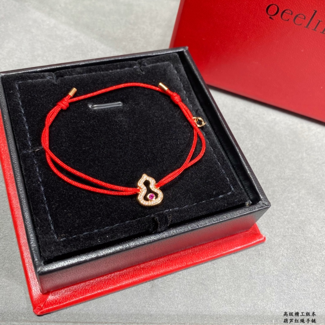 Qeelin Wulu bracelet 18k rose gold red cord clear diamond pave ruby red center stone adjustable sliding knot fits 15-19cm wrist