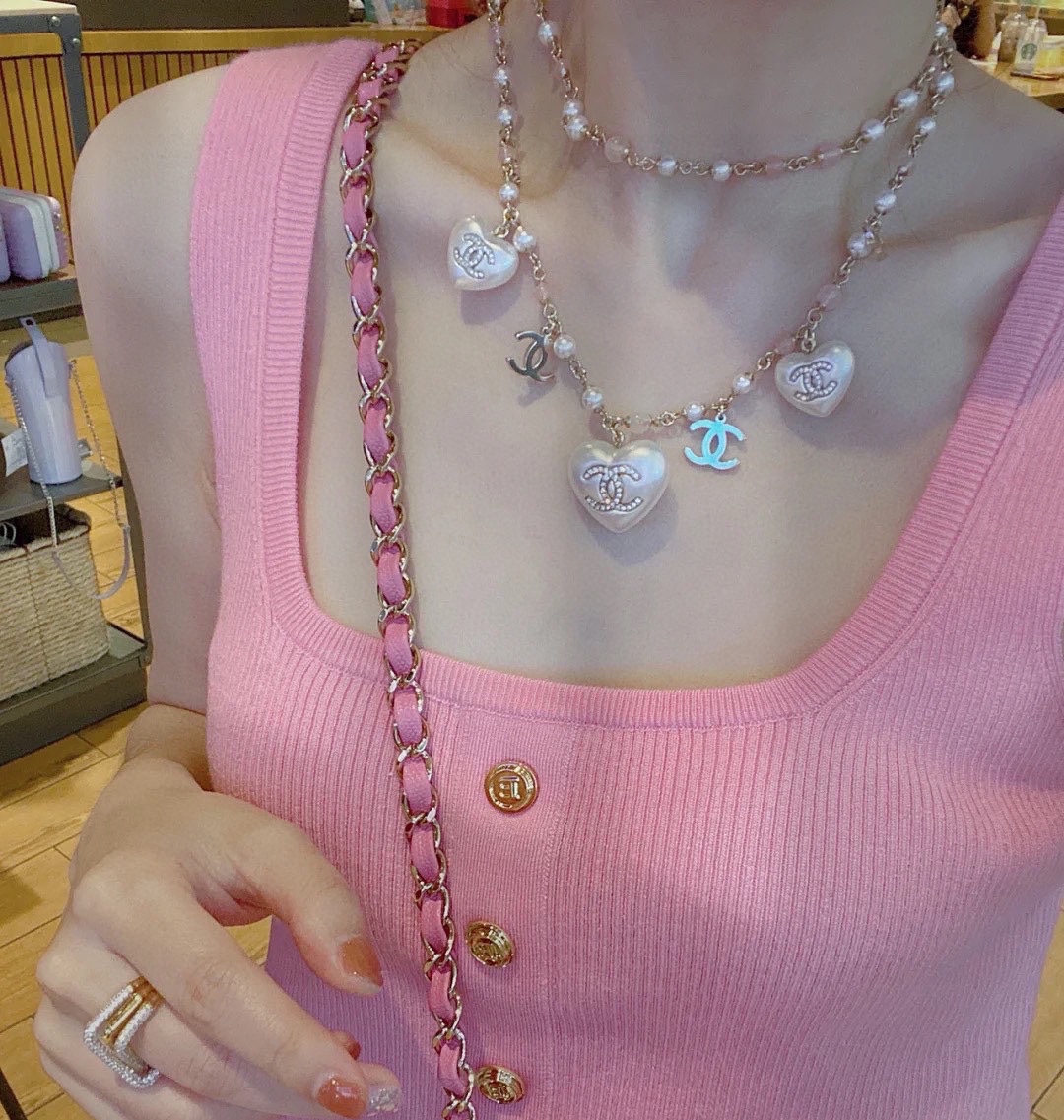 Chanel CC Heart Pearl Bead Long Chain necklace Gold-tone metal white faux pearl pink translucent bead white resin heart charm with crystal CC logo 80cm