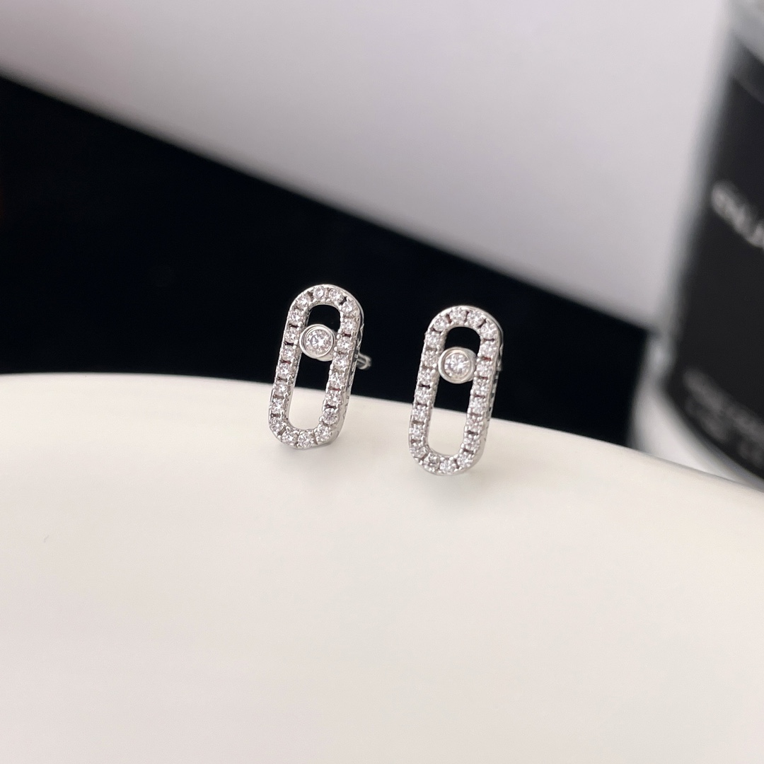 Messika Move Uno earrings Yellow gold with clear pave diamonds and central moving diamond 10mm stud length