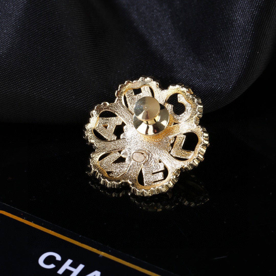 Chanel CC Logo Letter Flower Brooch brooch gold-tone metal clear crystal black enamel 3 5cm diameter