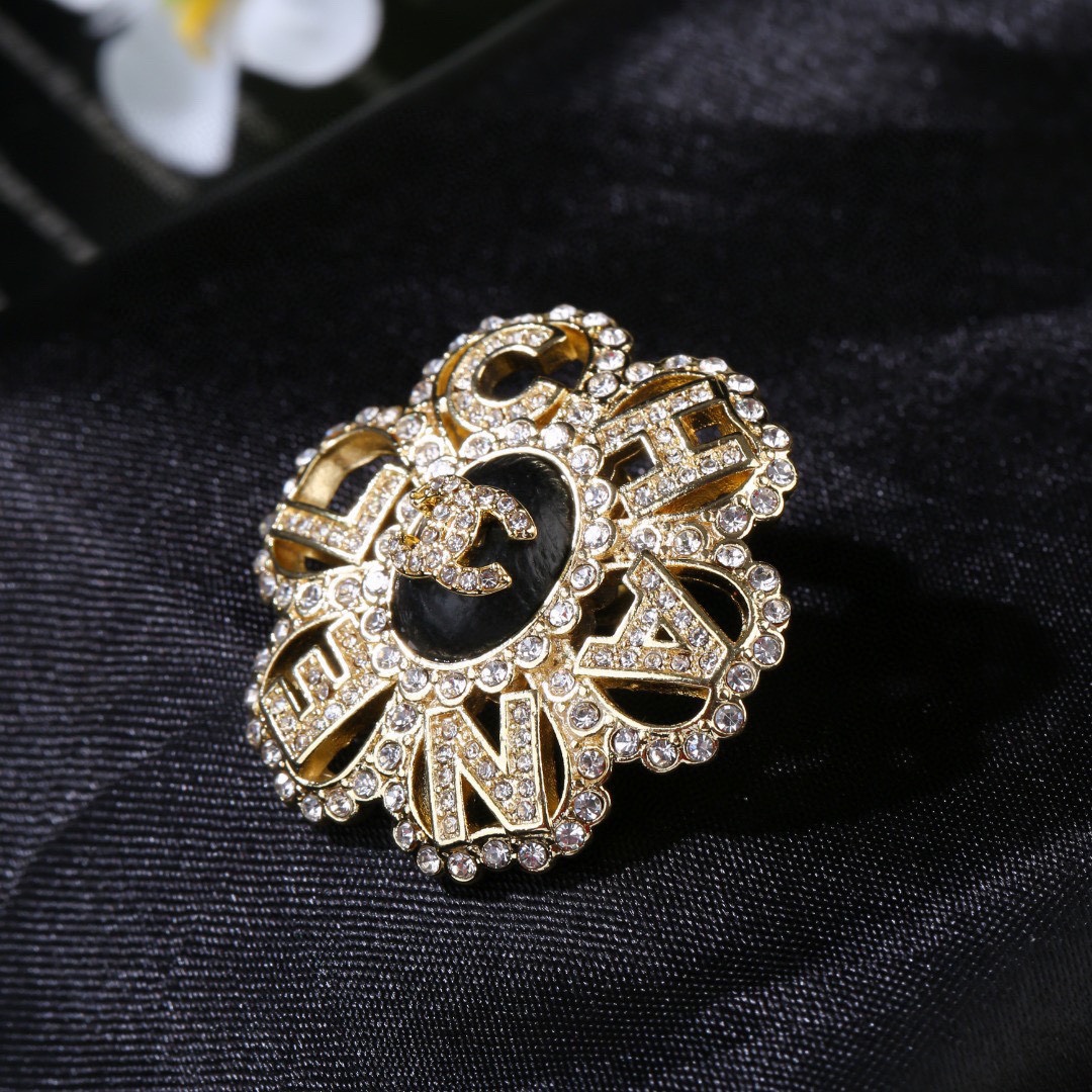 Chanel CC Logo Letter Flower Brooch brooch gold-tone metal clear crystal black enamel 3 5cm diameter
