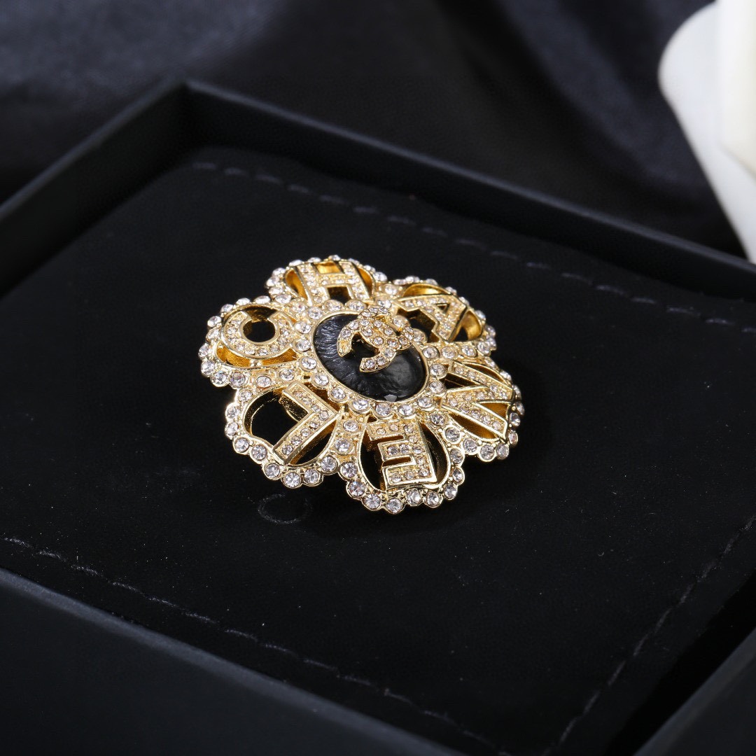 Chanel CC Logo Letter Flower Brooch brooch gold-tone metal clear crystal black enamel 3 5cm diameter