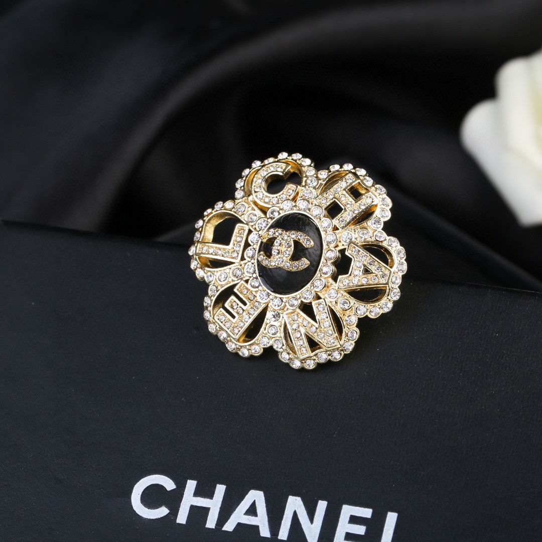 Chanel CC Logo Letter Flower Brooch brooch gold-tone metal clear crystal black enamel 3 5cm diameter
