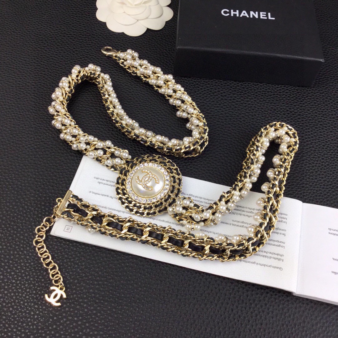 Chanel CC Logo Pearl Chain Medallion necklace gold-tone metal cream white faux pearls clear crystal rhinestones black leather chain accents 42cm with 5cm extender