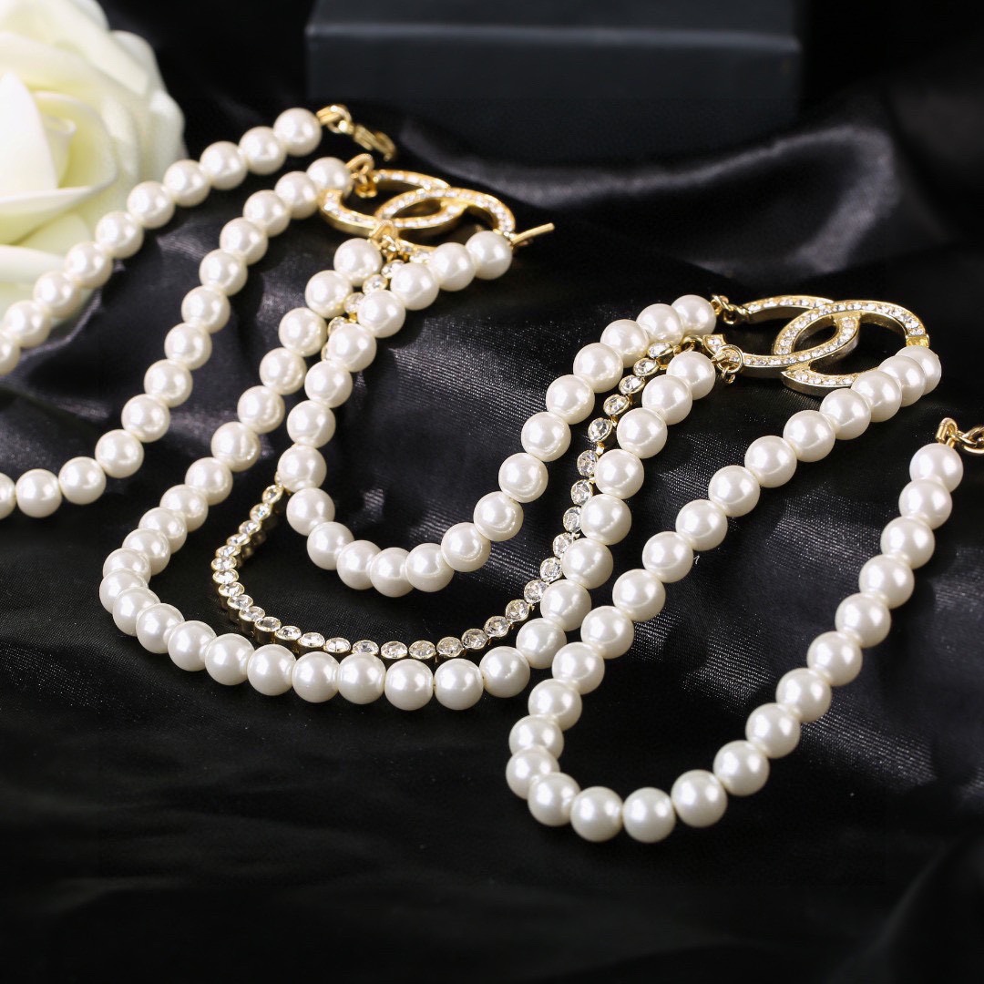 Chanel CC Logo Pearl Crystal Layered Necklace necklace Gold-tone metal white faux pearl clear crystal Adjustable 40-45cm