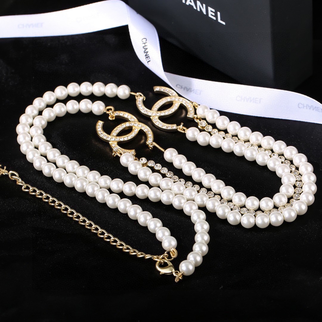 Chanel CC Logo Pearl Crystal Layered Necklace necklace Gold-tone metal white faux pearl clear crystal Adjustable 40-45cm