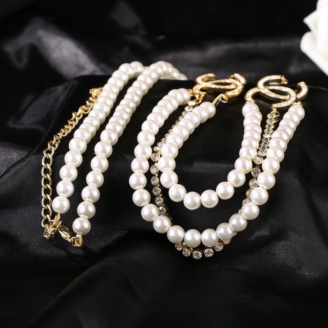 Chanel CC Logo Pearl Crystal Layered Necklace necklace Gold-tone metal white faux pearl clear crystal Adjustable 40-45cm