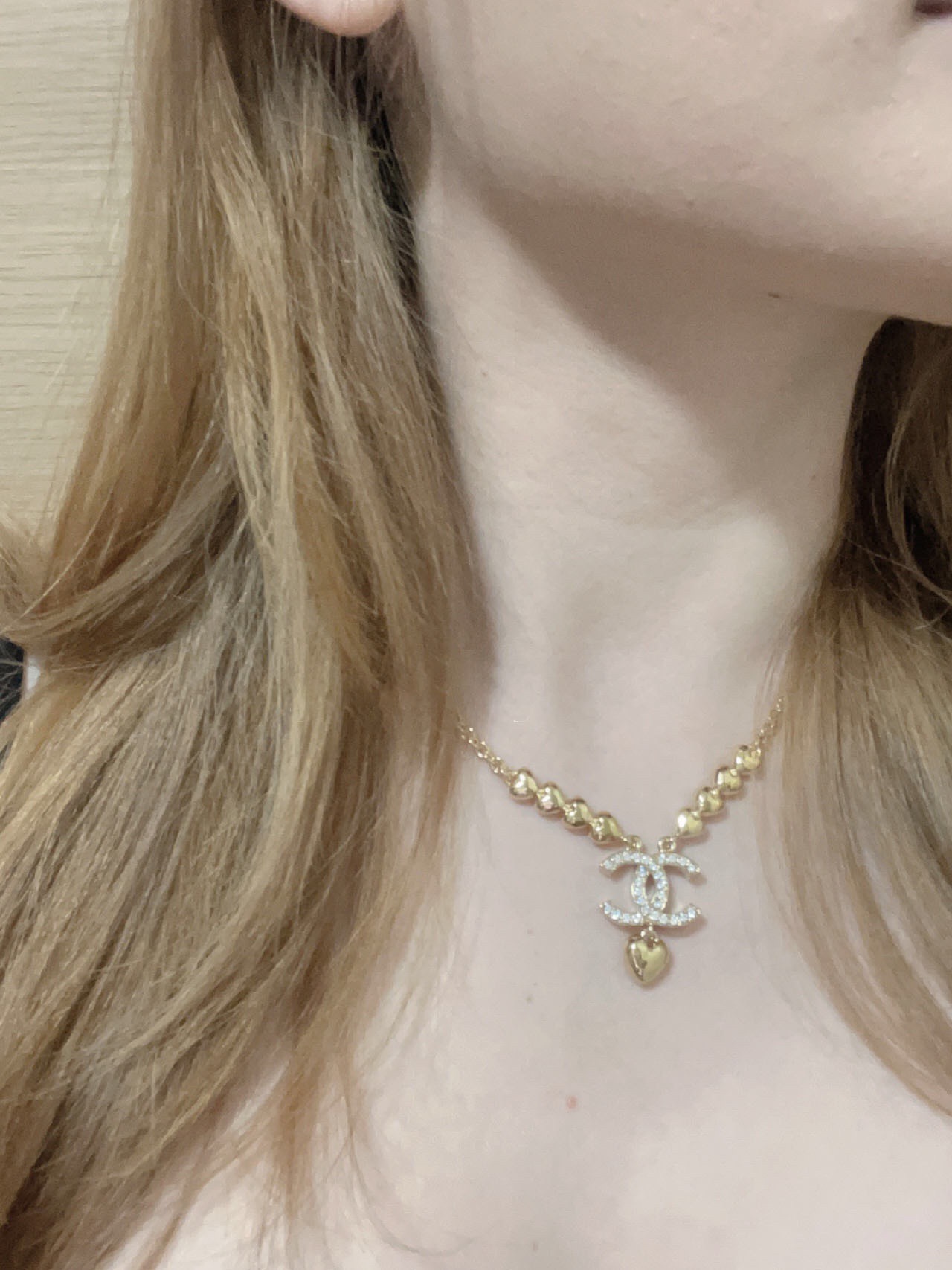 Chanel CC Heart Drop Necklace necklace Gold-tone metal with clear crystal accents and gold heart charm 42cm