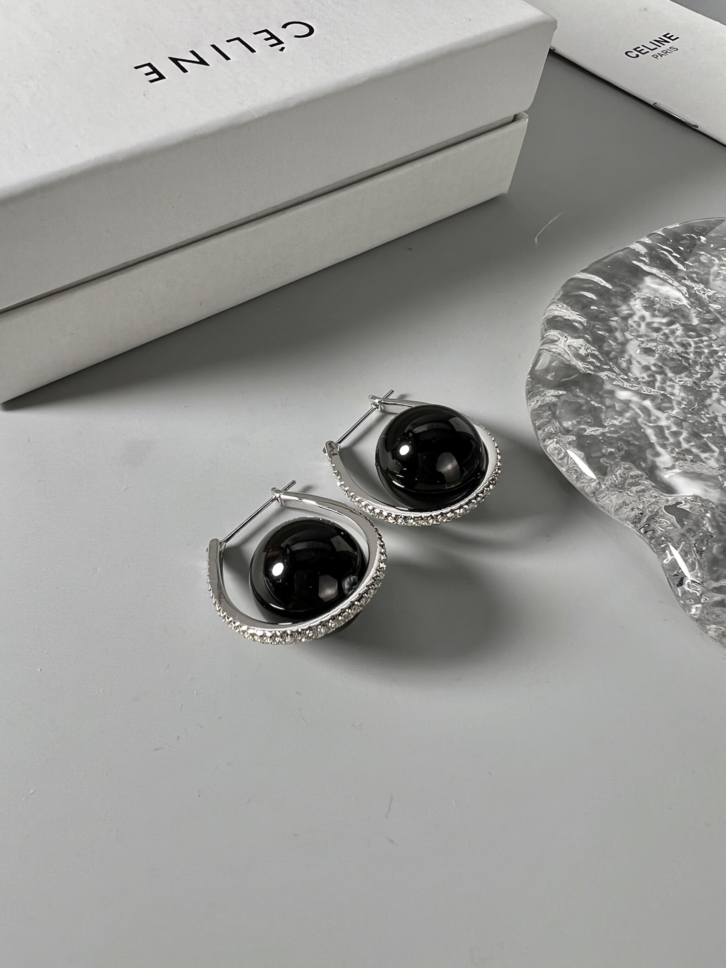 Celine YHED045 Black Ball Hoop Earrings earrings Rhodium-plated silver-toned metal with glossy black spherical cabochons and clear pave crystal accents 3cm hoop diameter