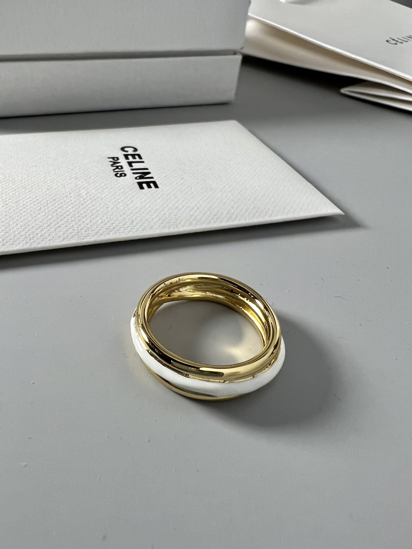 Celine YHJZ045 ring gold-tone metal with white enamel accent EU 54